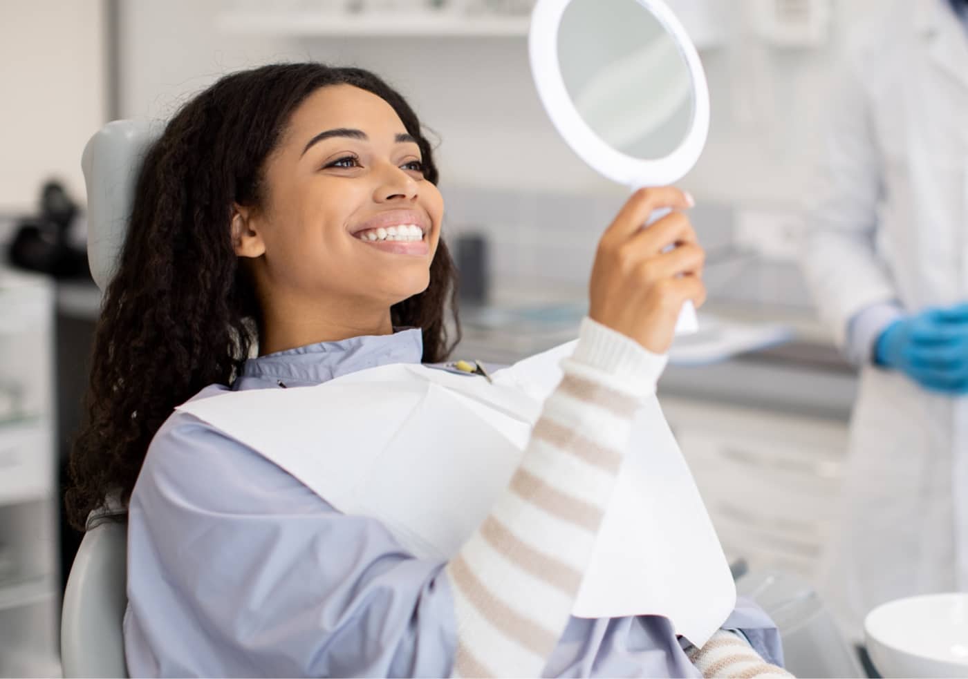 girl smiling at orthodontic consult
